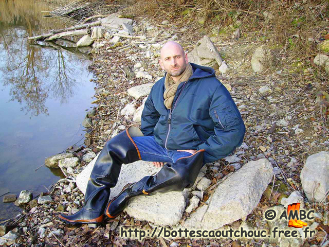 Wearing black waders at the marsh.