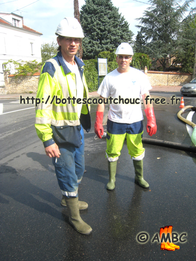 Two mates at work, France, 2007; Gummistiefel.