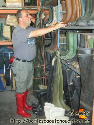 Kurt wearing red Hunter wellies at the House of the Rubber Boot. Gummistiefel, bottes caoutchouc, rubber boots, rubber laarzen, 2011.