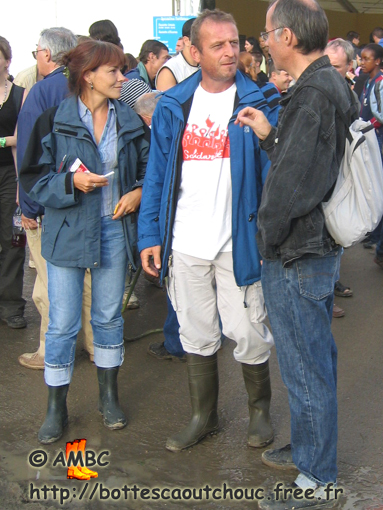 Rubberbooted couple. Gummistiefel, botas de goma, bottes en caoutchouc, Sept. 2005.