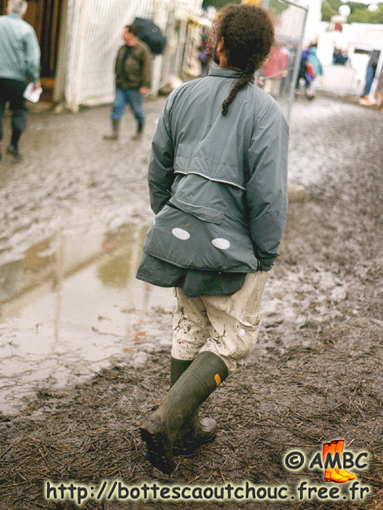 Young rasta guy wearing PVC work boots, 1998.