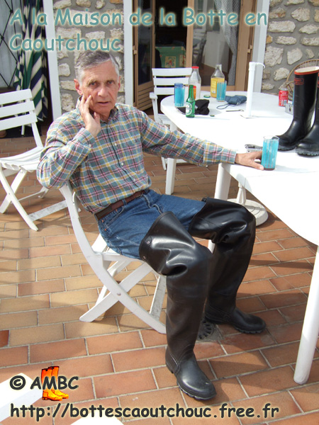 Wearing Tretorn waders at the House of the Rubber Boot, France.