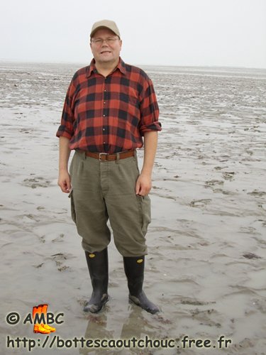 Wearing Superga black rubber boots in Cancale, France, 2006.