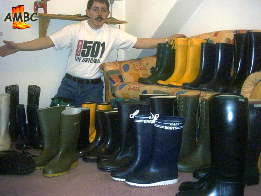 Lars happy in the middle of his wellies,  2007. Gummistiefel, bottes caoutchouc.