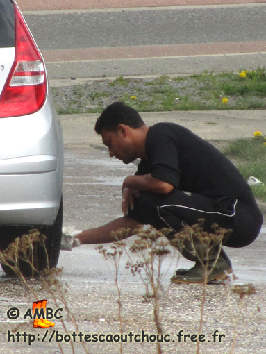 Carwash in Eupen, Belgium, April 2011. Gummistiefel, bottes caoutchouc, gumboots.