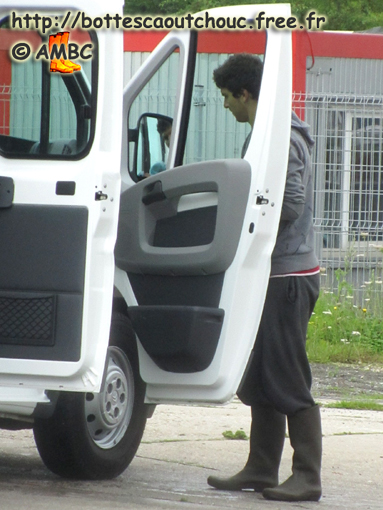 Carwash in Belgium, July 2011. Gummistiefel, bottes caoutchouc, gumboots.