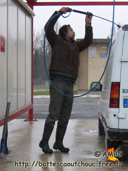 Macho man in Melun, France, February 2006. Gummistiefel, bottes caoutchouc, rubber boots.