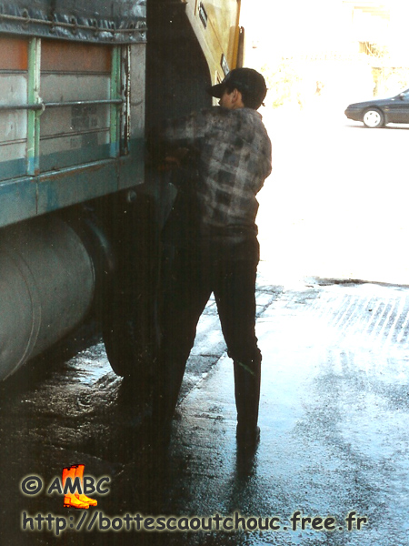 Young dirty cleaner, Patras, Greece, 1996. bottes caoutchouc, gumboots.