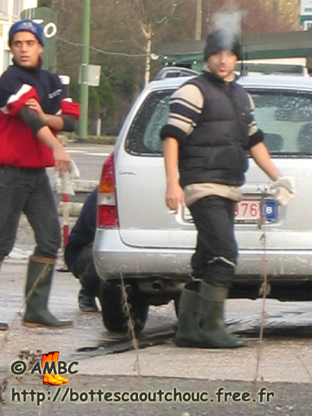 Young car washers in wellies, Malmedy, Belgium. Gummistiefel, bottes caoutchouc.