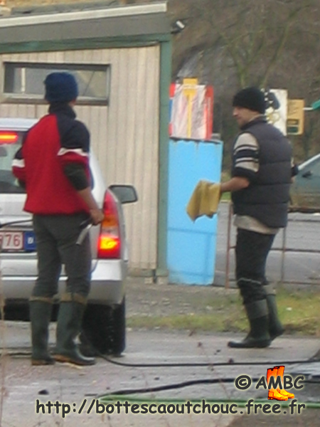 Car washers in wellies, Malmedy, Belgium. Gummistiefel, bottes caoutchouc.