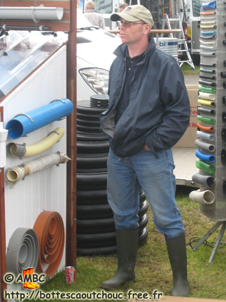 Wearing a cap, jeans & wellies.   Gummistiefel, botas de goma, bottes en caoutchouc, rubber laarzen, 2007.
