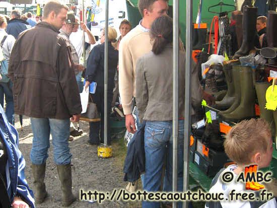 A booted guy among rubber boots. Gummistiefel, botas de goma, bottes en caoutchouc, rubber laarzen, 2007.