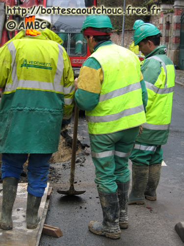 Workers in Melun, March 2008. Rubber boots.