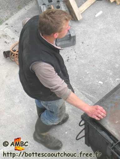 Young worker in gumboots, Dammarie Les Lys, 2009.