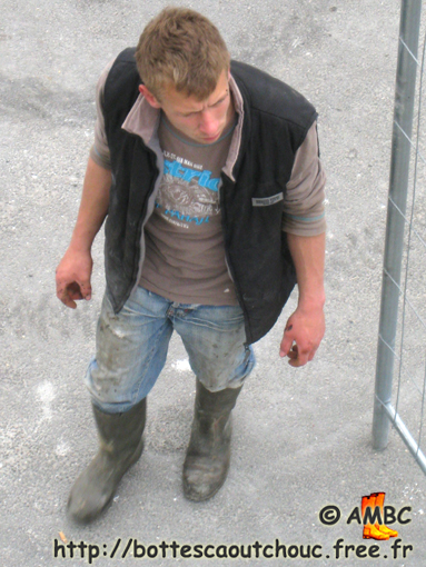 Young dirty worker in gumboots, Dammarie Les Lys, May 2009.