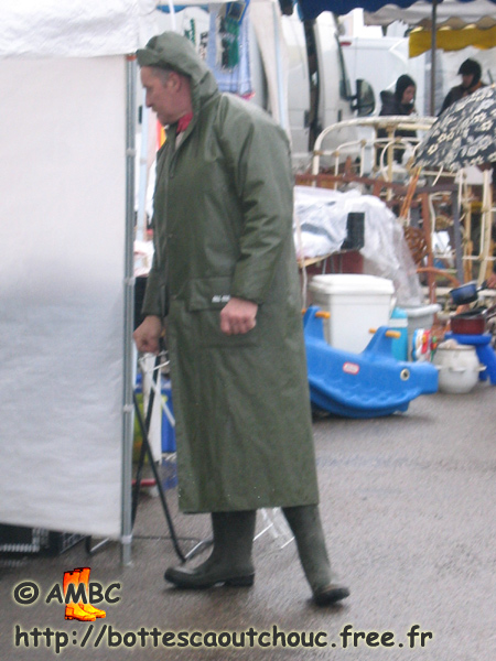 Full PVC and rubber boots; a guy in a flea-market, Dammarie, 2006.
