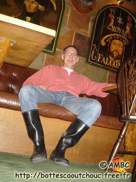 In rubber boots in a pub.