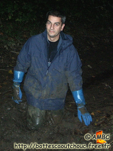 Ricky wearing waders in the mud. Gummistiefel, bottes caoutchouc, gumboots, 2009.