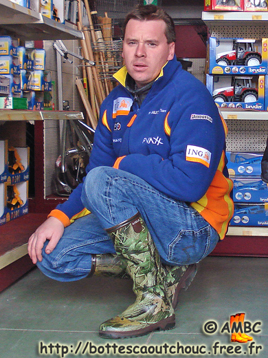 Christophe in front of toys, 2011. Gummistiefel, wellies, botas de goma, stivali di gomma, rubber laarzen, bottes caoutchouc.