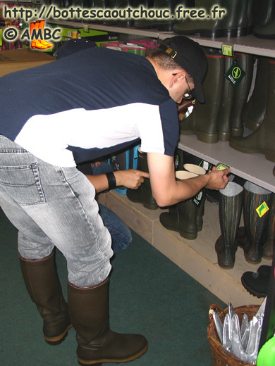 Frédéric in front of wellies, 2011. Gummistiefel, wellies, botas de goma, stivali di gomma, rubber laarzen, bottes caoutchouc.