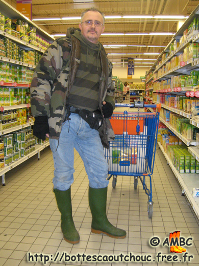 Pascal wearing green boots in a supermarket, 2007. Gummistiefel, wellies, botas de goma, stivali di gomma, rubber laarzen, bottes caoutchouc.