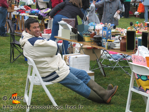 Seller wearing PVC wellies, 2006.