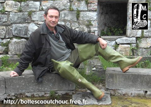 Wearing Superga waders.