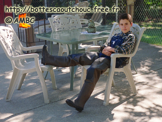 Alec wearing waders on the terrace.