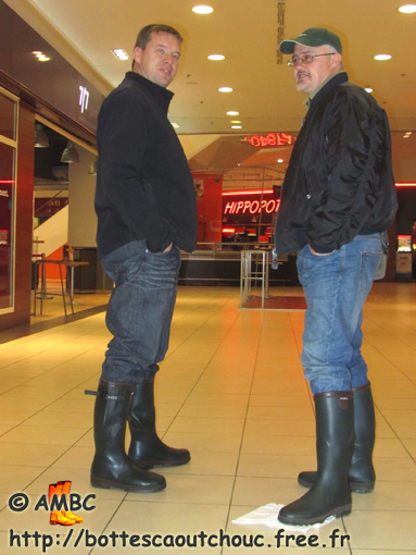 Pascal & Christophe in a commercial piazza; at the House of the Rubber Boot, France, 19 Jan 2011.