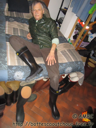 Jaques wearing rubber shirt & Superga boots; at the House of the Rubber Boot, France, 2011.
