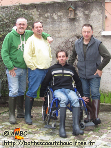 Mates in wellies around Eric; at the House of the Rubber Boot, France,  Feb. 2011.