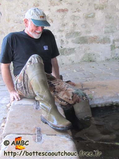 Jim wearing old cut off waders in France, 2011.