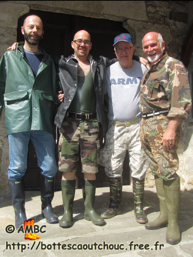 4 rubberbooted fans near the House of the Rubber Boot, France, 22 May  2011.