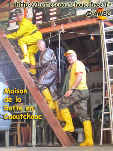 3 rubberbooted fans in YELLOW Hunter wellies; France,  Sept. 2011.