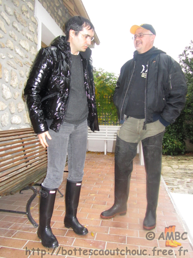 José & Pascal wearing rubber boots at the House of the Rubber Boot, France, Nov. 2010.