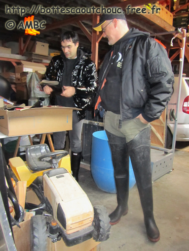 José & Pascal comparing rubber boots; at the House of the Rubber Boot, France, Nov. 2010.