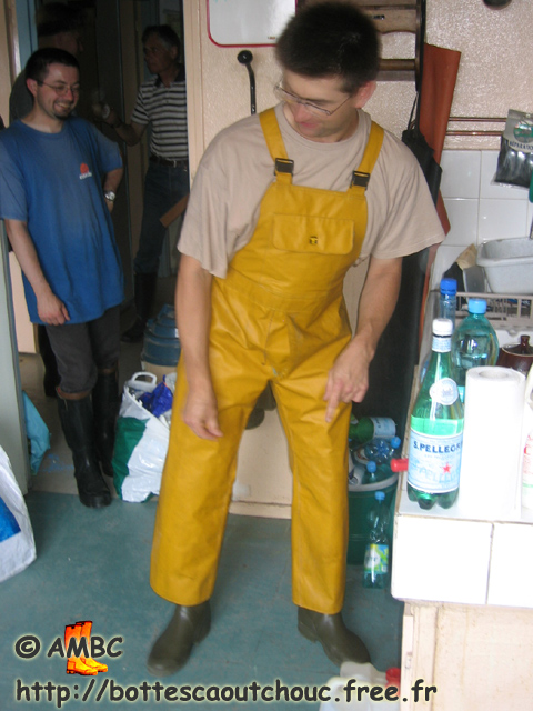 Fabrice with Frederic wearing yellow PVC raingear. July 2005.