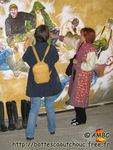 Art teacher making comments on the painting, May 2007.