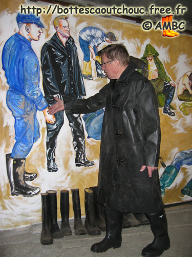 Raine in black rubber raingear, May 2007.