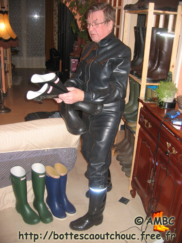 Raine, admiring the Hunter wellies, Feb. 2007.