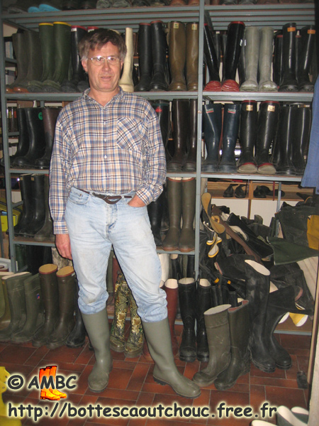 Jean-Pierre wearing Hyper Major (Baudou) boots in front of the range of boots.