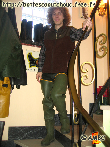 Pierrot is climbing down the staircase, wearing Le Chameau green waders, Feb. 2006