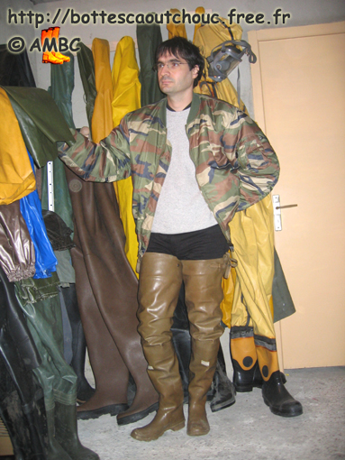 José-Luis wearing waders among PVC gear; gumboots, stivali di gomma, Gummistiefel, 2008.