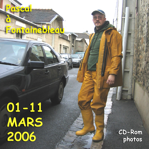 WEARING YELLOW PVC RAINCOAT, FEB 2006.