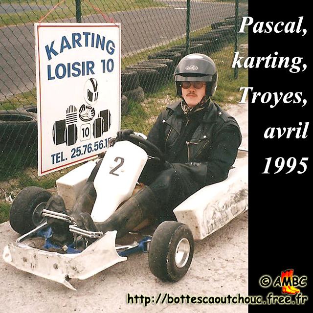 Pascal, playing Karting, wearing rubber boots & gloves; rubber laarzen. Copyright Pascal Bourcier, 1995.