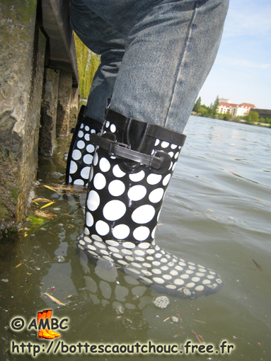Wearing black & white "peas" wellies, 2009.