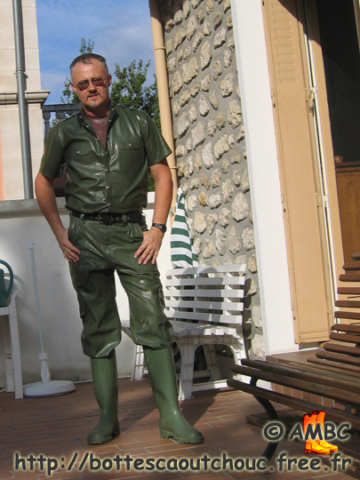Wearing green rubber at the House of the Rubber Boot, 2006. 