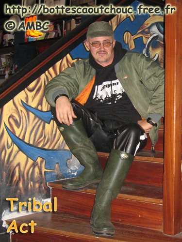 Pascal, wearing rubber trousers, leather chaps & rubber boots Le Chameau, Paris, Nov. 2006.