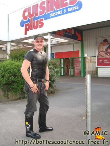 Wearing rubber T-shirt & Smiley wellies at a commercial piazza, 2009.